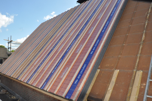 Projectfoto van het na-isoleren met SlimFix RenoTwin op bestaand dak.